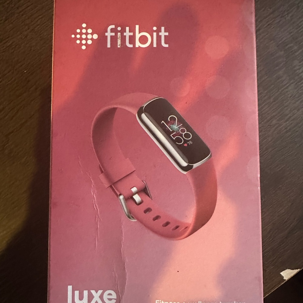Fitbit luxe used maybe 3x. Great condition with charger and box.